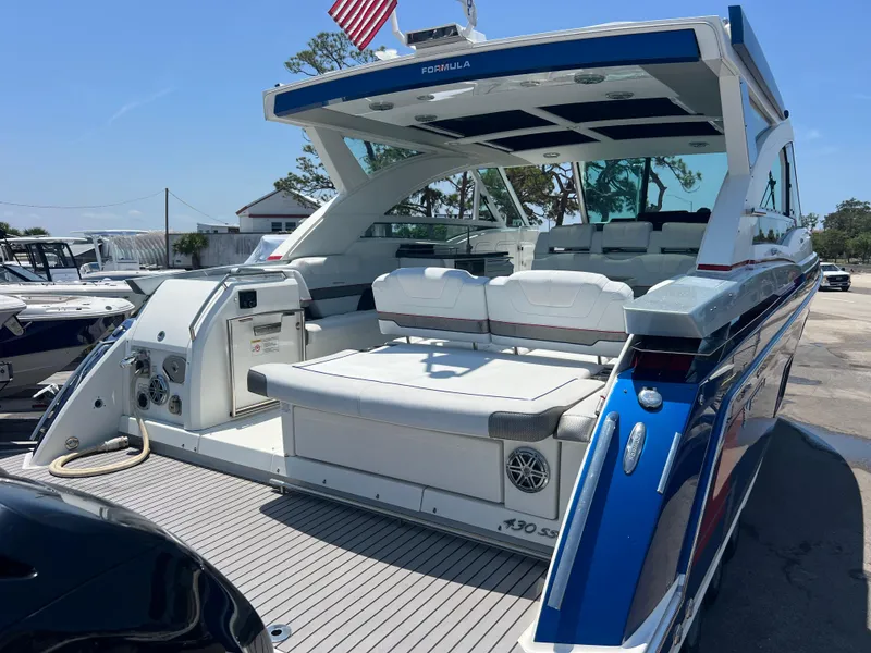 Slide: The Image of 2017 Formula 430 Super Sport Crossover boat stern and outboard motors on trailer. - 9