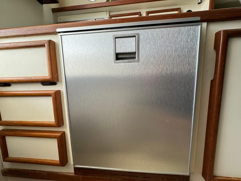 Slide: The Image of Stainless steel appliance in the kitchen of a 1992 Blackfin 29 Express boat. - 20