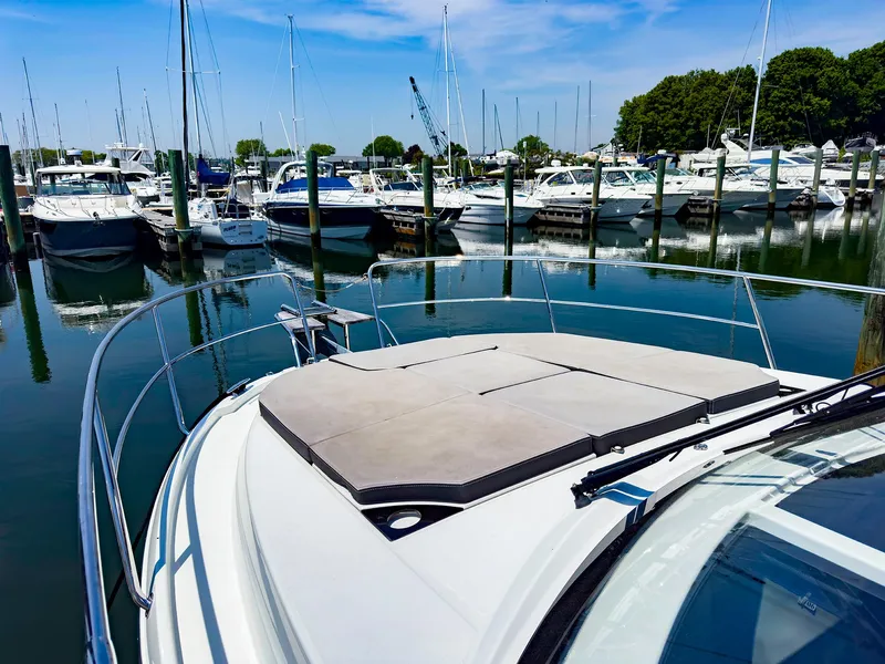 Slide: The Image of 2021 Jeanneau NC 1095 FLY at marina with other boats. - 26