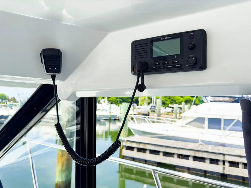 Slide: The Image of VHF radio system on the 2021 Jeanneau NC 1095 FLY boat. - 5