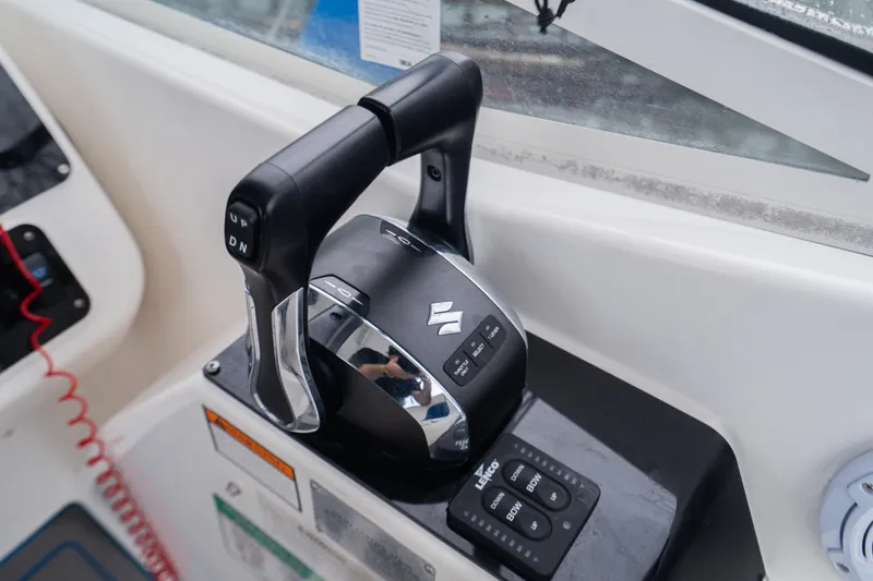 Slide: The Image of Suzuki throttle control on 2002 Century 3200 Walk-Around boat. - 14