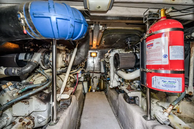 Slide: The Image of Engine room of a 2005 Sea Ray 420 Sedan Bridge yacht. - 26