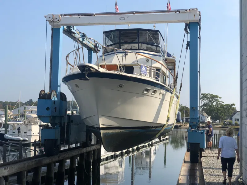The Image of 1981 Hatteras 48 Motor Yacht in dry dock, marina setting. - 0