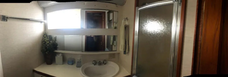 Slide: The Image of Bathroom interior of 1981 Hatteras 48 Motor Yacht with sink and shower. - 15