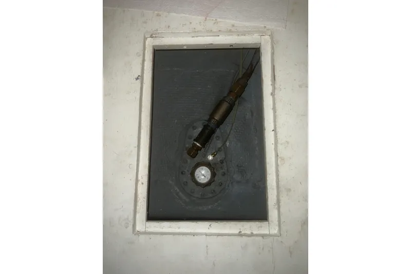 Slide: The Image of Access panel on 1981 Hatteras 48 Motor Yacht, showcasing internal components. - 23