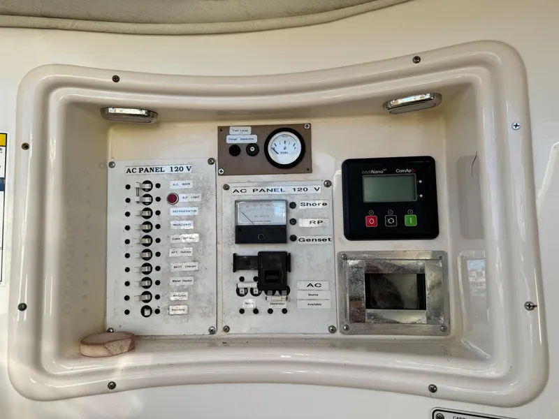 Slide: The Image of 2006 Century 3200 Walk-Around AC panel with gauges and controls. - 11