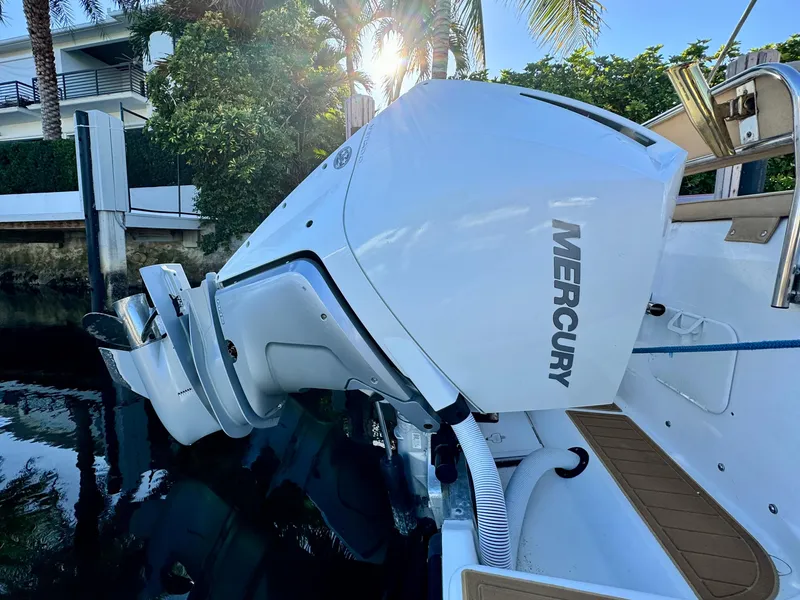 Slide: The Image of 2006 Century 3200 Walk-Around boat with Mercury outboard engine. - 5