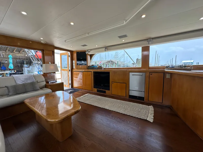 Slide: The Image of Interior of a 1996 Donzi Custom Enclosed Flybridge yacht with modern amenities. - 40