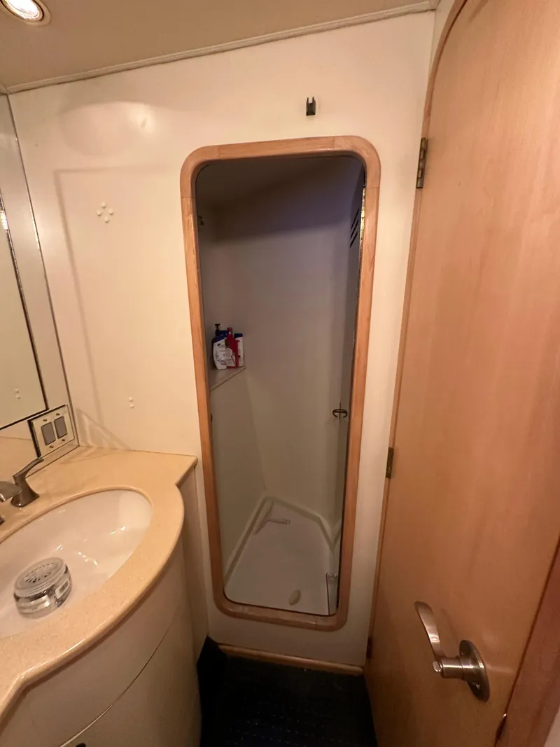 Slide: The Image of Donzi Custom Enclosed Flybridge 1996 - 80