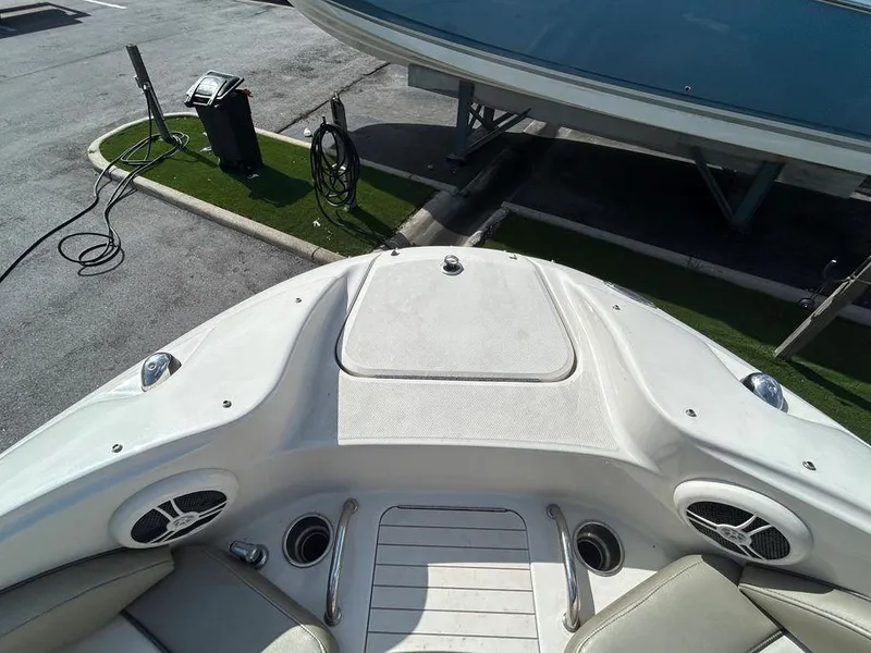 Slide: The Image of 2007 Sea Ray 220 Sundeck boat bow with speakers and cup holders. - 35
