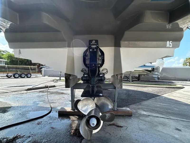 Slide: The Image of 2007 Sea Ray 220 Sundeck boat stern with propeller in dry dock. - 40