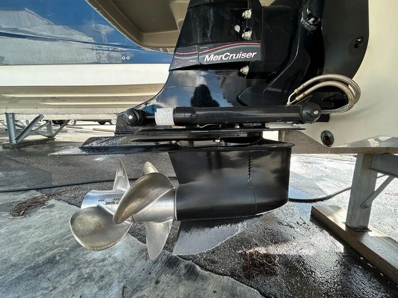 Slide: The Image of Close-up of 2007 Sea Ray 220 Sundeck MerCruiser propeller and stern drive. - 41