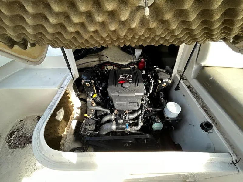 Slide: The Image of 2007 Sea Ray 220 Sundeck engine compartment with 5.0L MPI engine. - 9