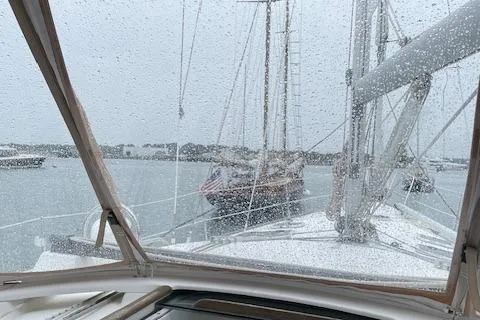 Slide: The Image of Sailing on a rainy day aboard a 2005 Beneteau 423 yacht. - 17