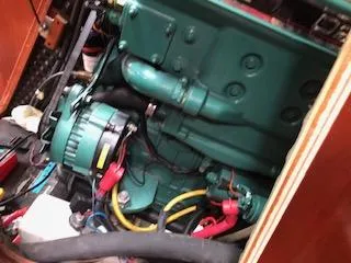 Slide: The Image of Engine compartment of a 2005 Beneteau 423 sailboat, featuring wiring and components. - 40