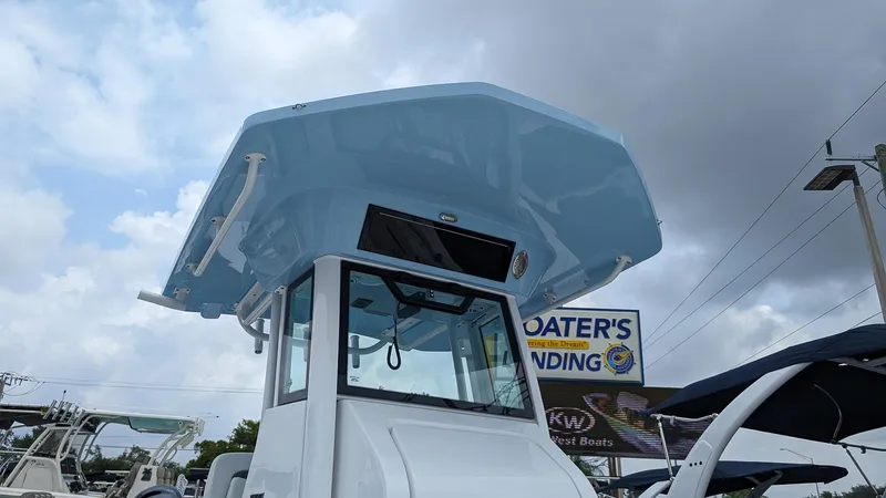 Slide: The Image of 2024 Wellcraft 263 Fisherman boat at Boater's Landing under cloudy sky. - 21