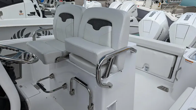 Slide: The Image of 2024 Wellcraft 263 Fisherman boat with dual seats and stainless steel handrails. - 8