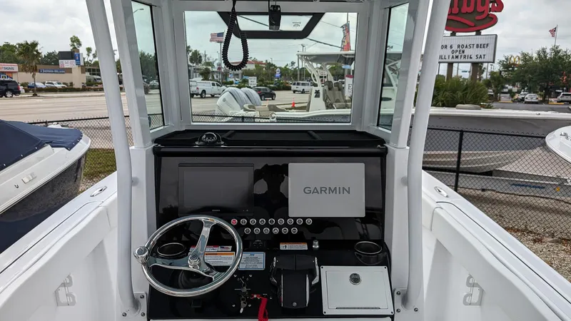 Slide: The Image of 2024 Wellcraft 263 Fisherman boat console with Garmin navigation system. - 9