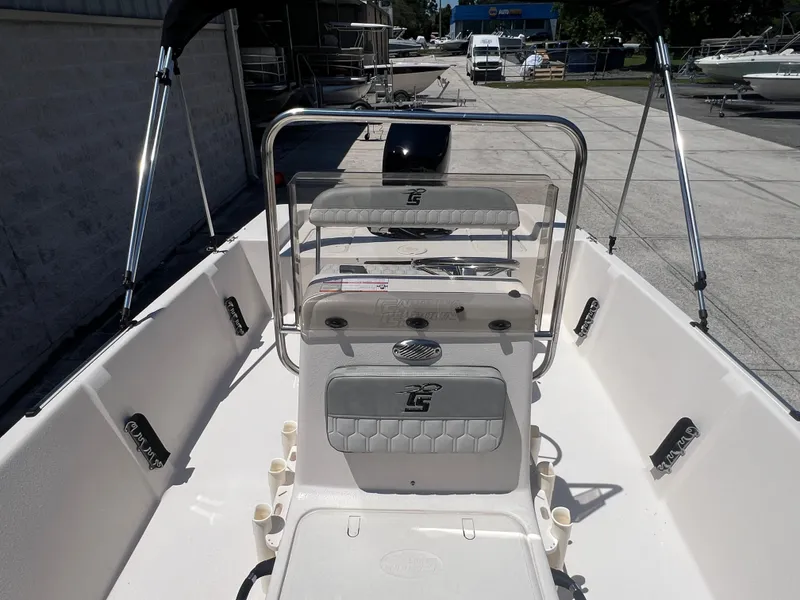 Slide: The Image of 2024 Carolina Skiff EV198 boat interior with seating and console. - 5