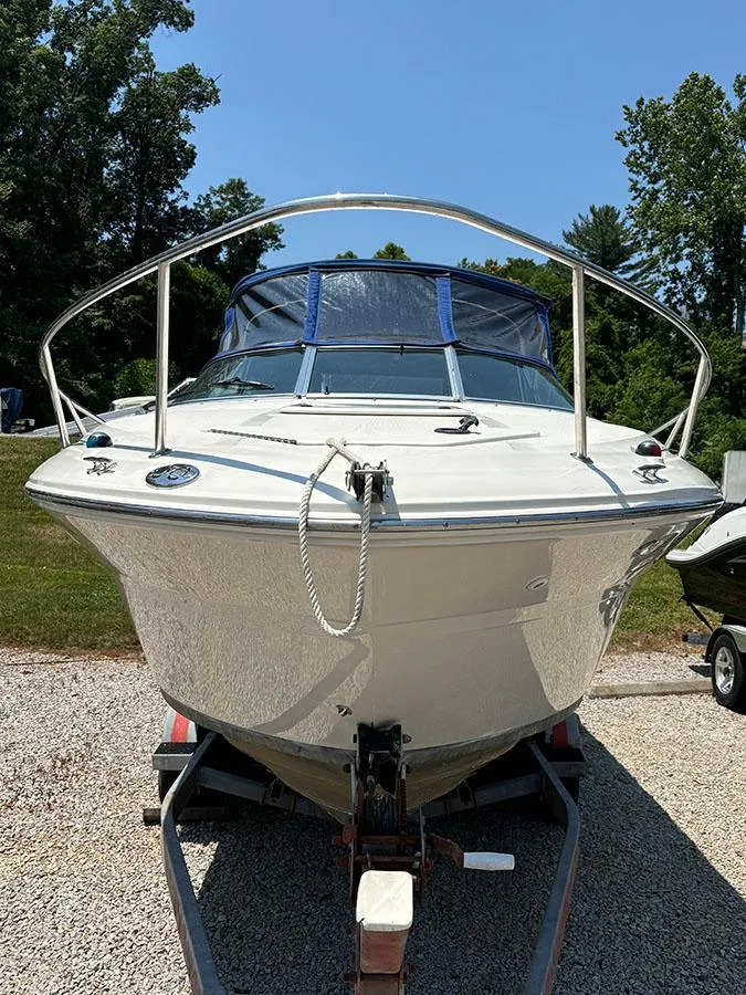 Slide: The Image of 2003 Sea Ray 225 Weekender boat on trailer, front view. - 1