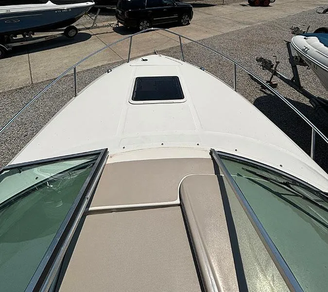 Slide: The Image of 2003 Sea Ray 225 Weekender boat deck view at marina. - 18
