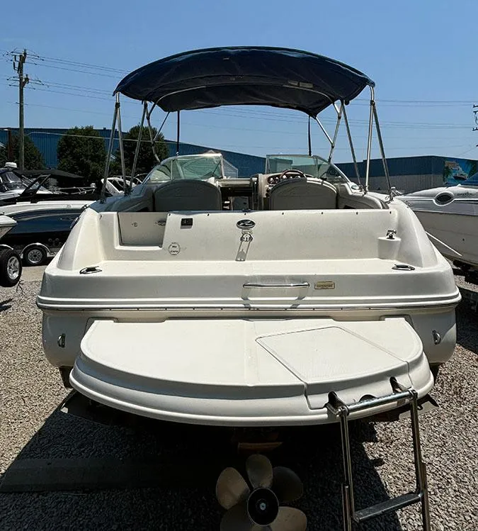 Slide: The Image of 2003 Sea Ray 225 Weekender boat with canopy and swim platform. - 3