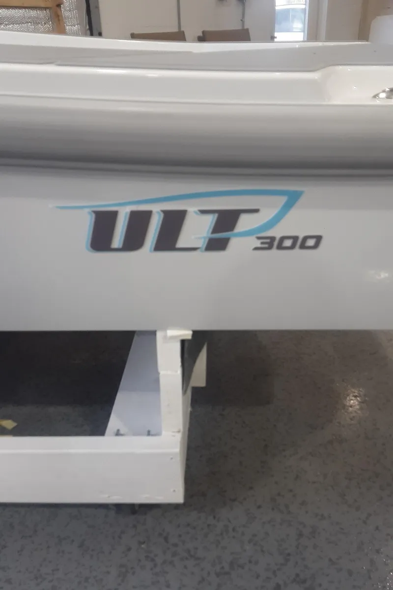 Slide: The Image of 2024 Ultra Lite Tenders ULT 300 boat side view. - 12