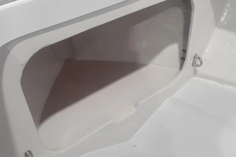Slide: The Image of Storage compartment of Ultra Lite Tenders Rigged 300, 2024 model boat. - 17