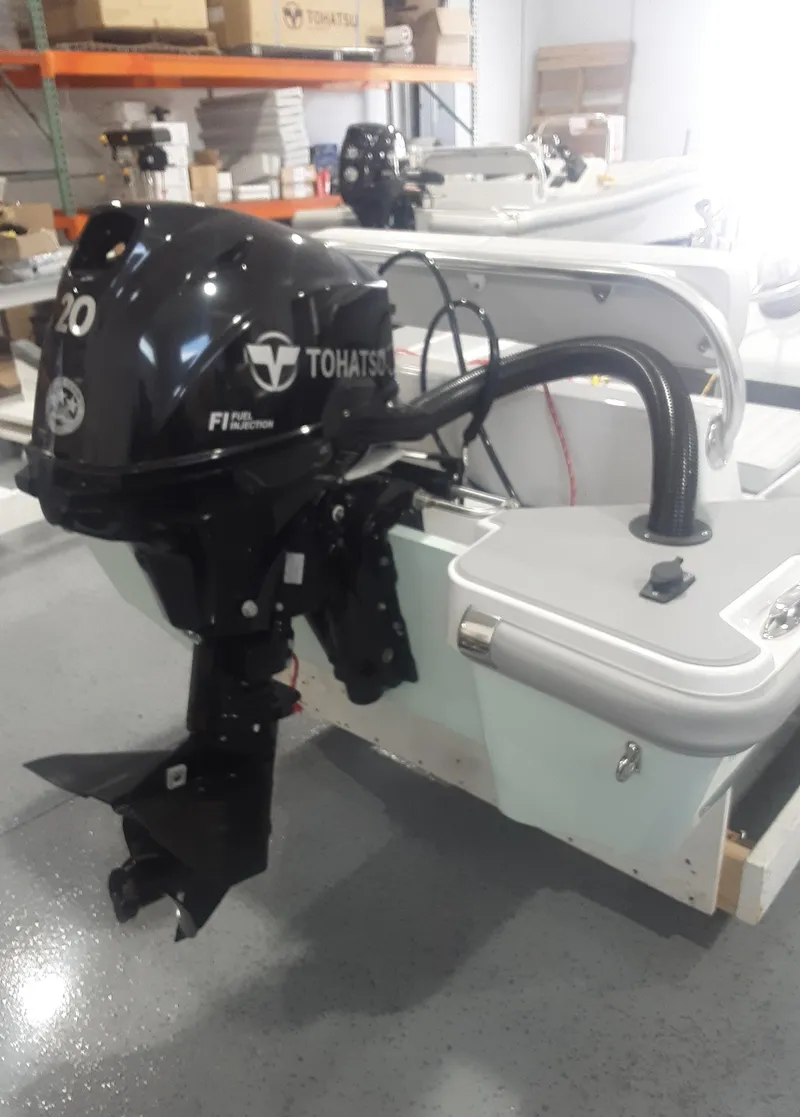 Slide: The Image of 2024 Ultra Lite Tenders Rigged 300 with Tohatsu outboard motor. - 6