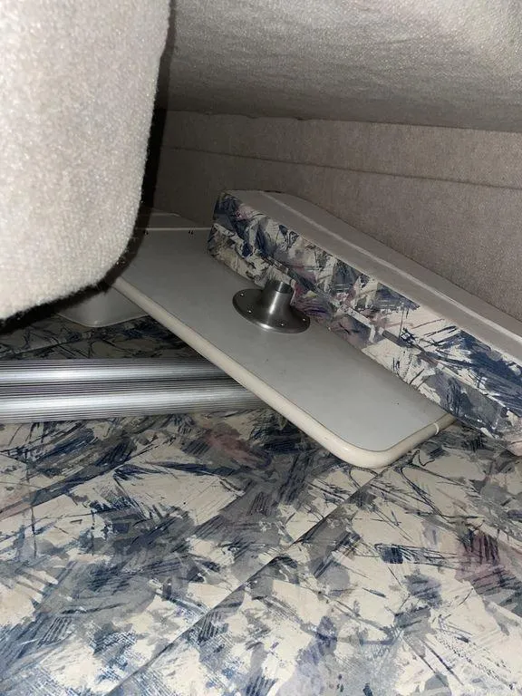 Slide: The Image of 1998 Sea Ray 240 Sundancer cabin interior with sink and control panel. - 19