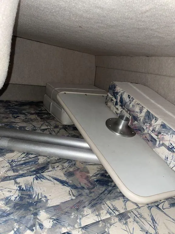 Slide: The Image of Electrical panel of 1998 Sea Ray 240 Sundancer boat with switches and voltage meter. - 23