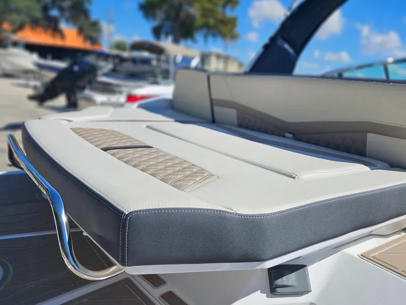 Slide: The Image of 2025 Monterey 275SS boat with luxurious seating and modern design. - 11