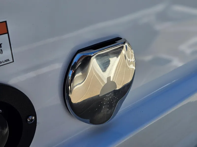 Slide: The Image of Close-up of 2025 Monterey 275SS boat's chrome fuel cap. - 17