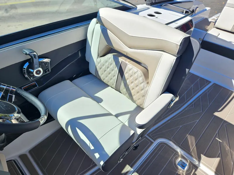 Slide: The Image of Captain's seat of the 2025 Monterey 275SS boat with luxurious upholstery. - 19
