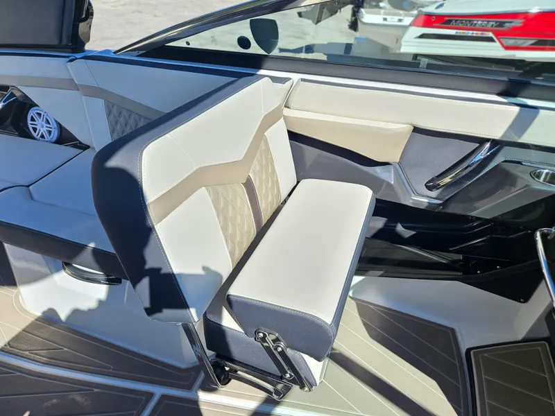 Slide: The Image of 2025 Monterey 275SS boat interior with modern seating and sleek design. - 21