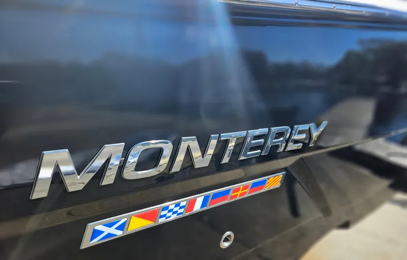 Slide: The Image of 2025 Monterey 275SS boat with nautical flags. - 4