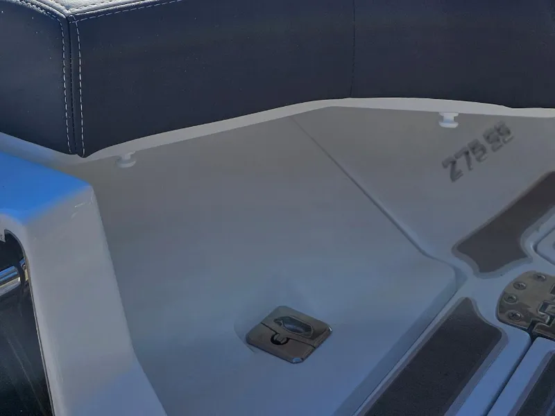 Slide: The Image of 2025 Monterey 275SS boat interior with seating and deck details. - 12