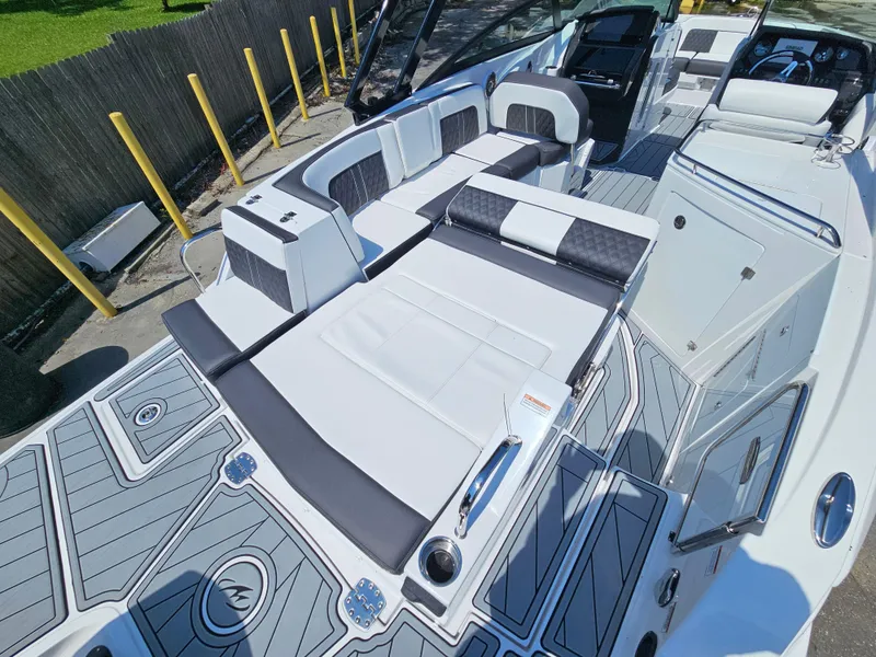 Slide: The Image of Luxurious 2025 Monterey M-65 boat interior with sleek seating and modern design. - 17