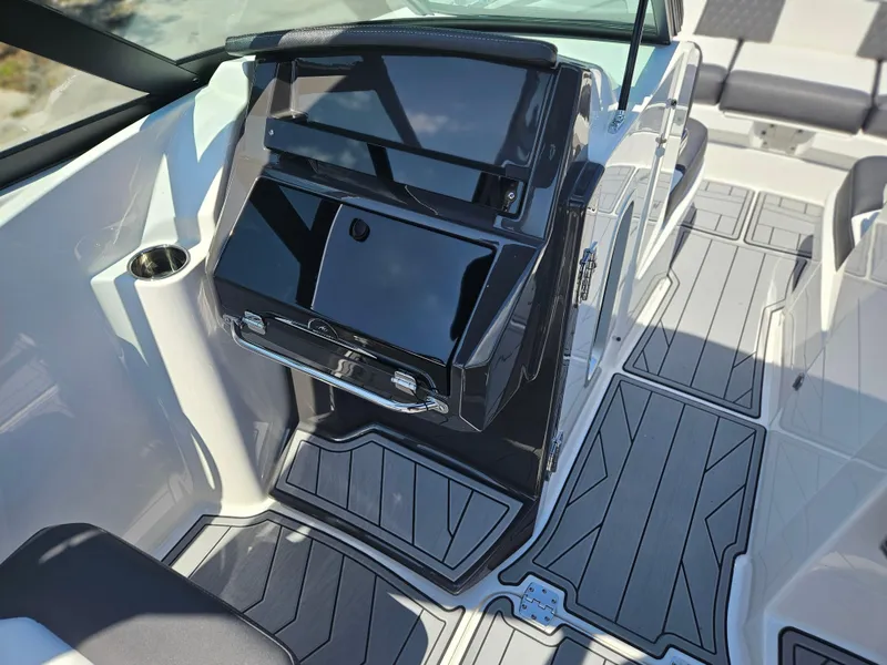 Slide: The Image of Interior of a 2025 Monterey M-65 boat with sleek design and modern features. - 26