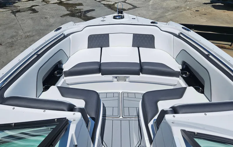 Slide: The Image of 2025 Monterey M-65 boat interior with sleek seating and modern design. - 30