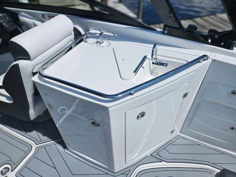 Slide: The Image of Luxury interior of 2025 Monterey M-65 boat with sleek sink and seating. - 9