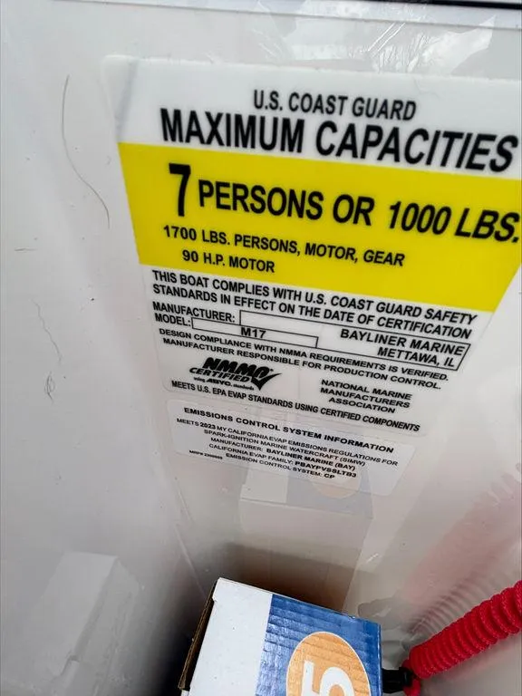 Slide: The Image of 2023 Bayliner 170 EL boat capacity label, 7 persons or 1000 lbs, 90 HP motor. - 5
