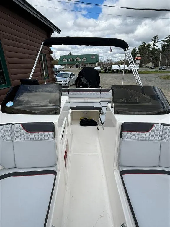 Slide: The Image of 2023 Bayliner 170 EL boat interior with seating and windshield. - 7