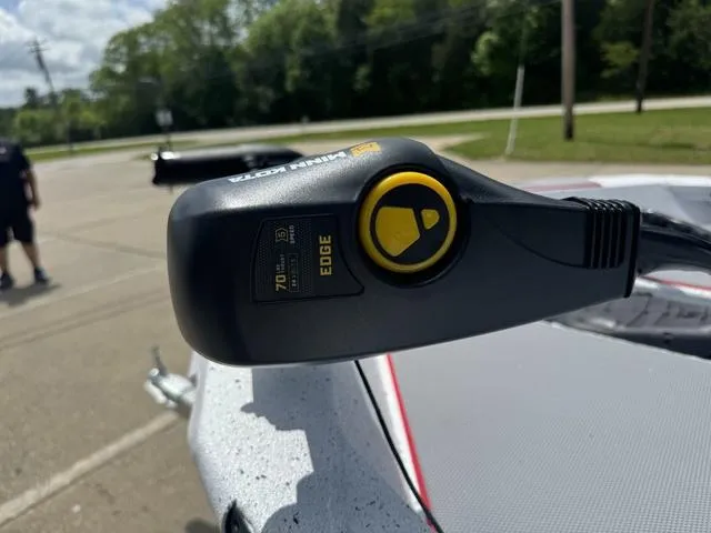 Slide: The Image of Close-up of a 2024 Xpress Boats H18 trolling motor control. - 10