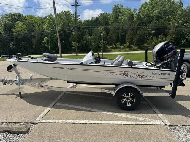 Slide: The Image of 2024 Xpress Boats H18 on trailer, side view. - 14