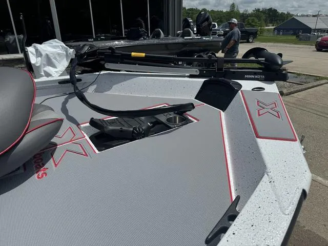 Slide: The Image of 2024 Xpress Boats H18 deck with Minn Kota trolling motor. - 6