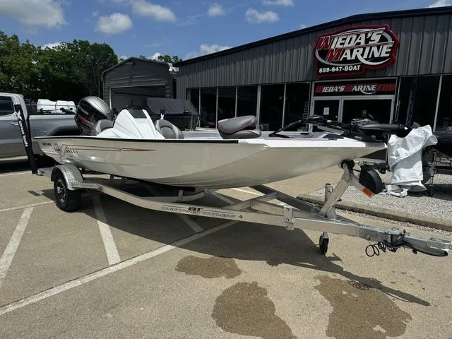 Slide: The Image of 2024 Xpress Boats H18 on trailer at Wieda's Marine dealership. - 8