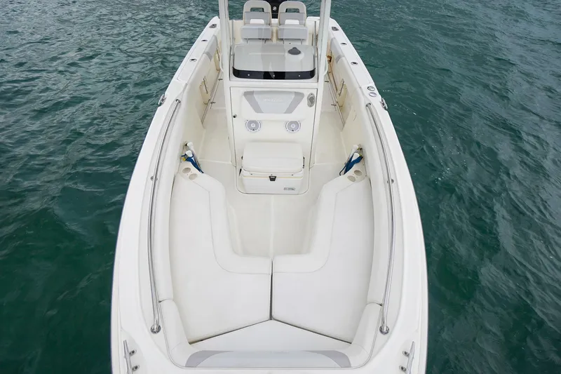 Slide: The Image of 2015 Boston Whaler 220 Outrage boat interior on water. - 25