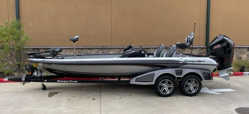 Slide: The Image of 2024 Ranger Z521R Ranger Cup Equipped boat on a trailer, side view. - 0