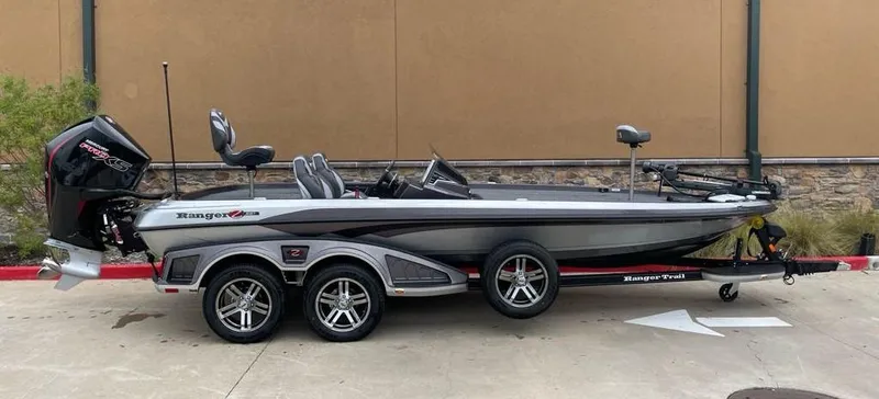 Slide: The Image of 2024 Ranger Z521R Ranger Cup Equipped fishing boat on trailer. - 2